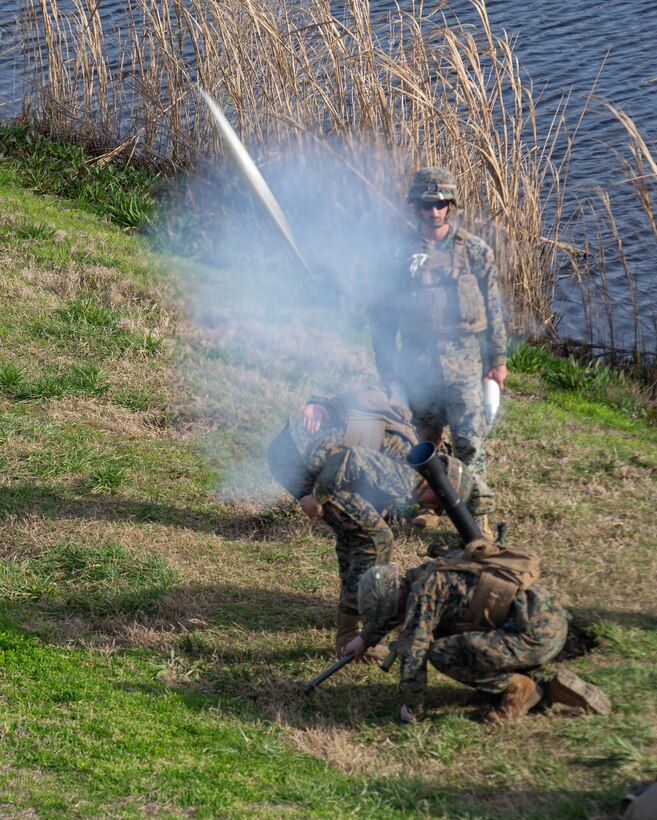 U.S. Marines with 1st Battalion, 2nd Marine Regiment, 2nd Marine Division, fire an M252 81mm mortar during Exercise Fireball Eagle at Marine Corps Air Station Cherry Point, N.C., Feb. 5, 2020. The training consisted of multiple scenarios using aircraft and ground support fire to simulate real warfighting situations. (U.S. Marine Corps photo by Lance Cpl. Brian Bolin Jr.)