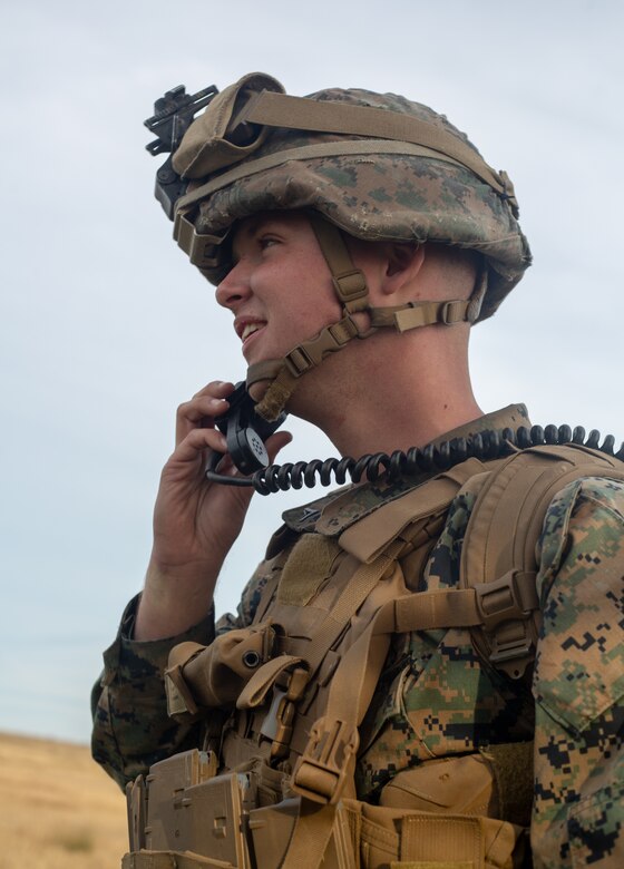 U.S. Marine Corps Lance Cpl. Michael Campillo, a mortarman with 1st Battalion, 2nd Marine Regiment, 2nd Marine Division, calls in a fire mission for mortars during Exercise Fireball Eagle at Marine Corps Air Station Cherry Point, N.C., Feb. 4, 2020. The training consisted of multiple scenarios using aircraft and ground support fire to simulate real warfighting situations. (U.S. Marine Corps photo by Lance Cpl. Brian Bolin Jr.)