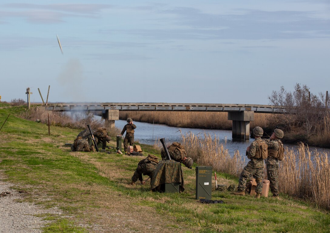 U.S. Marines with 1st Battalion, 2nd Marine Regiment, 2nd Marine Division, fire M252 81mm mortars during Exercise Fireball Eagle at Marine Corps Air Station Cherry Point, N.C., Feb. 5, 2020. The training consisted of multiple scenarios using aircraft and ground support fire to simulate real warfighting situations. (U.S. Marine Corps photo by Lance Cpl. Brian Bolin Jr.)