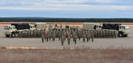 77th Sustainment Brigade (SB) poses for a photo during Warfighter Exercise at Holland Drop Zone, Fort Bragg, N.C. Feb. 2, 2019. The 77 SB participated in the exercise in preparation for their deployment to the U.S. Central Command Area of Responsibility. (Courtesy photo)