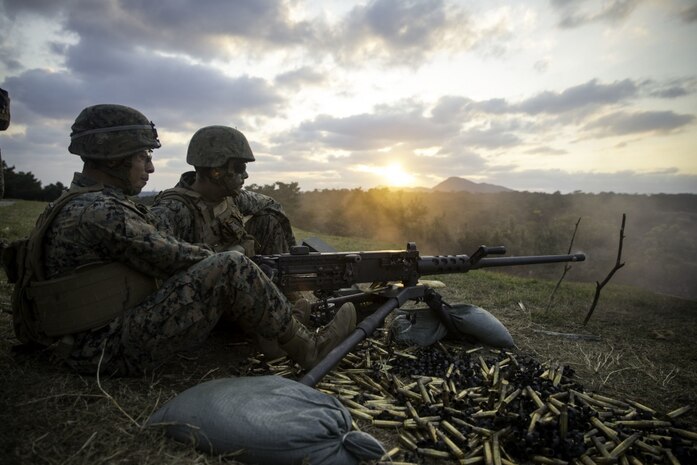 U.S. Marine Corps Cpl. Jacob Salas, an ammunition technician assigned to Headquarters Company, Headquarters Battalion, 3d Marine Division, fires an M2 .50 caliber machine gun at Camp Schwab, Okinawa, Japan, Feb. 6, 2020. Salas was participating in a mixed weapons range held for Marines who are attached to security platoon. During the range, the Marines fired thousands of rounds to increase and maintain proficiency with a variety of weapons systems.