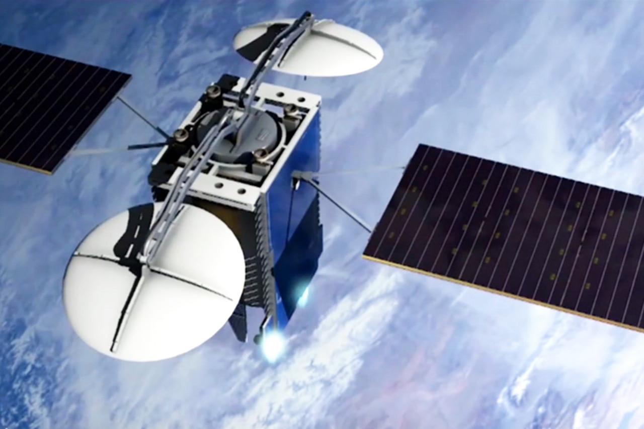 A satellite hovers over the Earth.