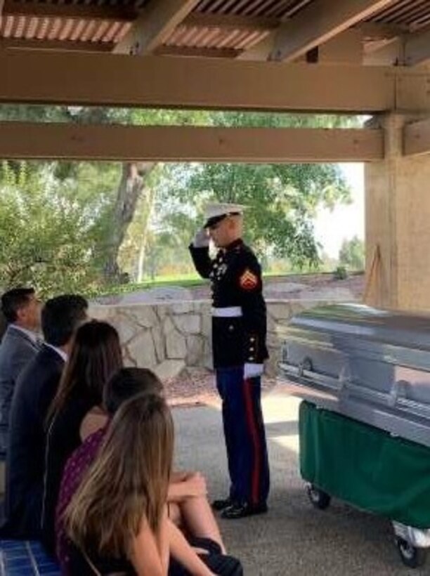 A Corporal from Weapons Company, 1st Battalion, 4th Marines, 1st Marine Regiment, conducts a memorial service for a veteran at Riverside National Cemetery, Riverside, California, Oct. 10, 2020. 1st Battalion, 4th Marines regularly participate in volunteer activities strengthening the bond between the USMC and the local community.