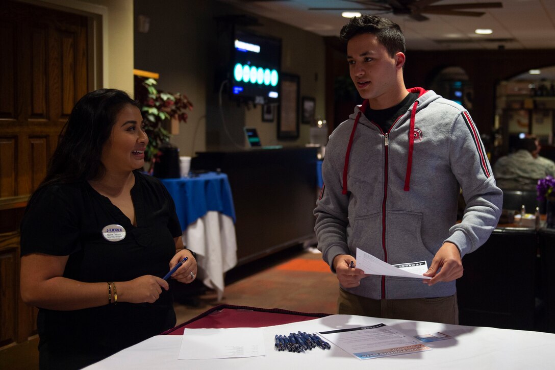 Photo of a 23d FSS member welcoming a focus group participant.