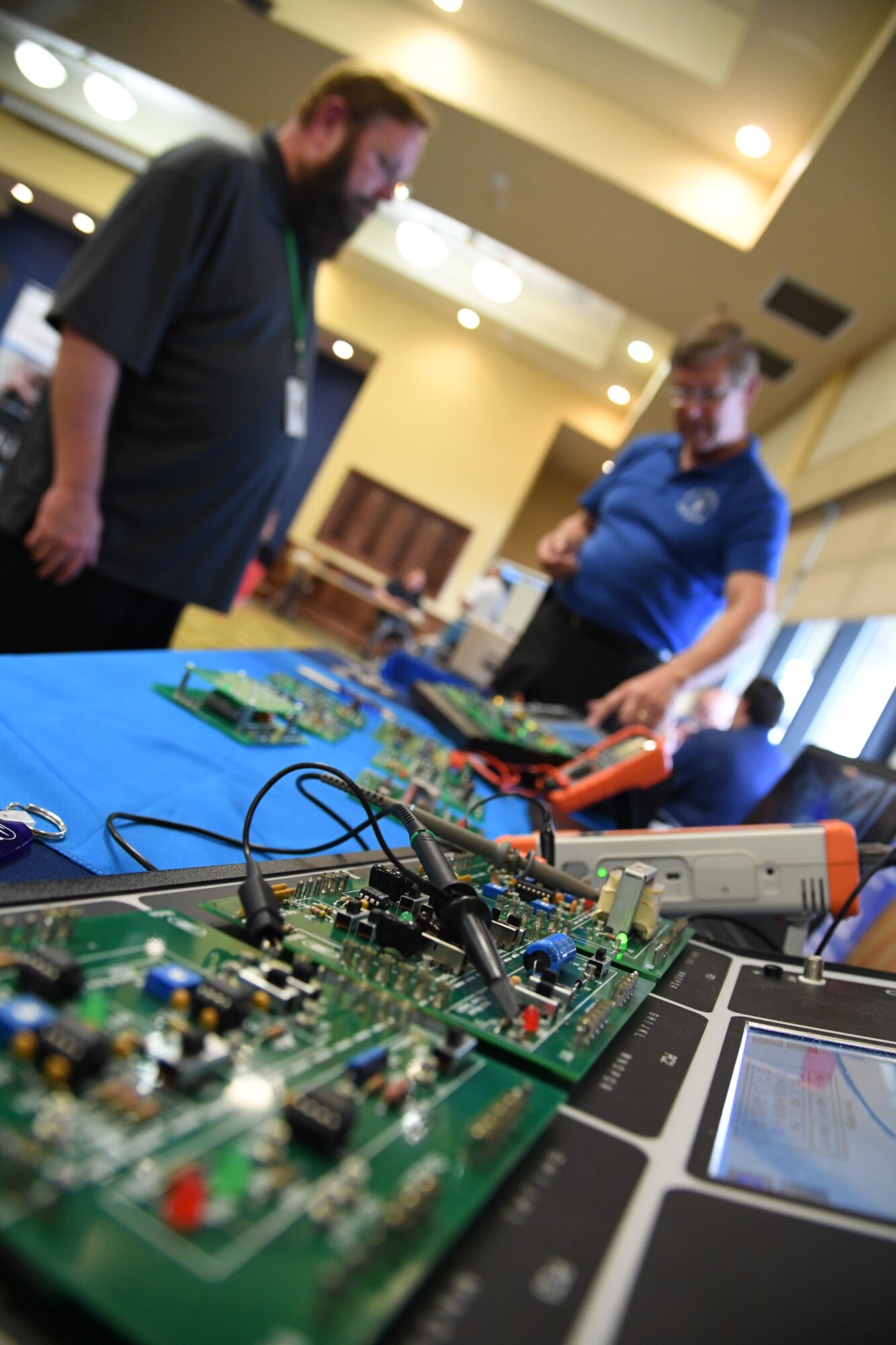 Electronics technical training equipment, which is used for basic electronics, are displayed as Joe Beauseigneur, Nida Corporation CEO, explains its training capabilities to Edward Wood, 338th Training Squadron training manager, during the Annual Keesler Air Force Base Tech Expo inside the Bay Breeze Event Center at Keesler Air Force Base, Mississippi, Feb. 11, 2020. The expo, hosted by the 81st Communications Squadron, was held to introduce military members to the latest in technological advancements to bolster the Air Force�s capabilities in national defense. (U.S. Air Force photo by Kemberly Groue)