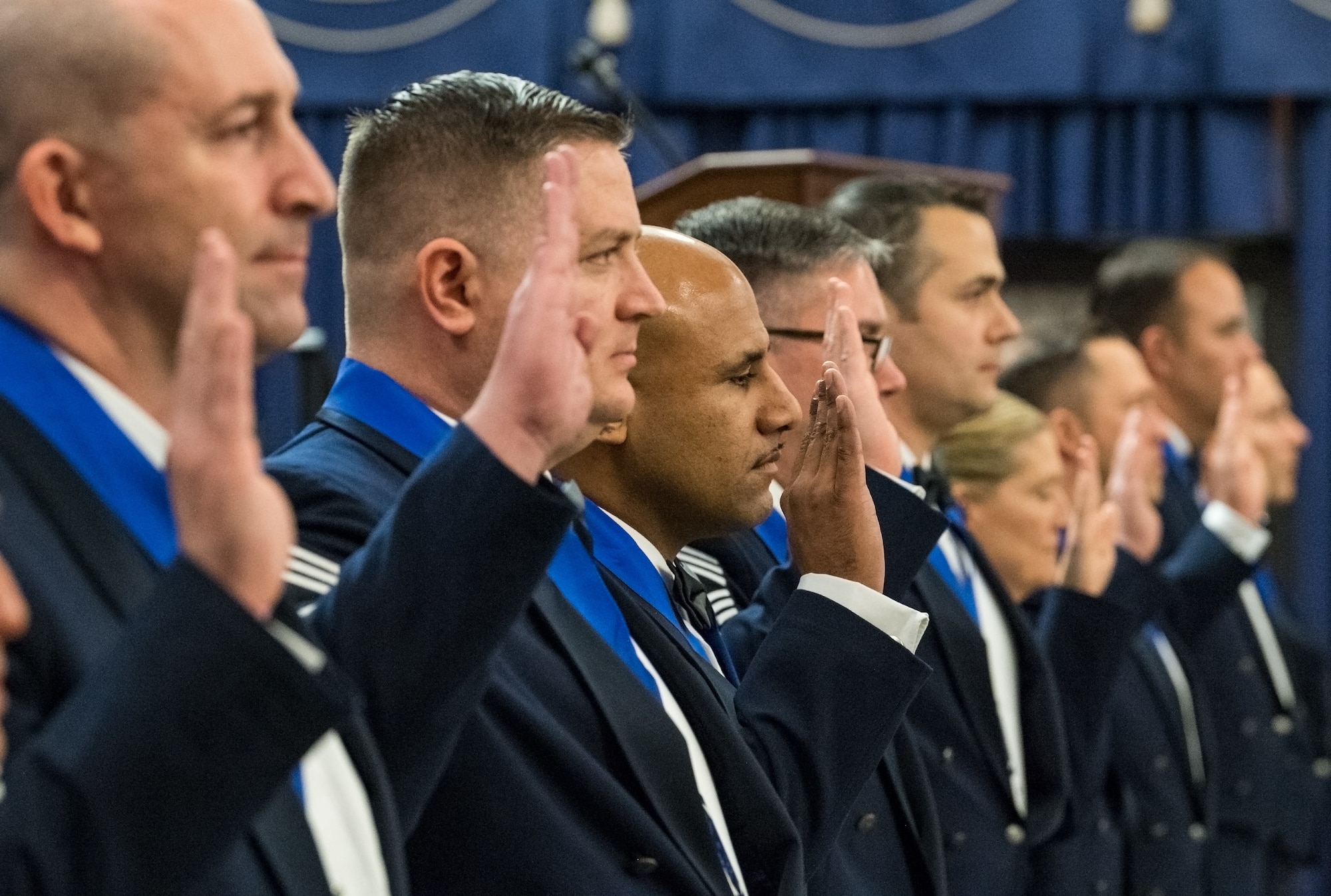 Chief Master Sgt. Albert Raymond, 712th Aircraft Maintenance Squadron superintendent; Chief Master Sgt. David Jackson, 512th Logistics Readiness Squadron superintendent; Senior Master Sgt. Jose Ramon, 736th Aircraft Maintenance Squadron unit superintendent and eight others take the Chief’s Charge during the Chief Master Sergeant Recognition Ceremony at the Landings, Feb. 8, 2020, on Dover Air Force Base, Del. Eleven senior master and chief master sergeants were honored for their achievement. (U.S. Air Force photo by Roland Balik)