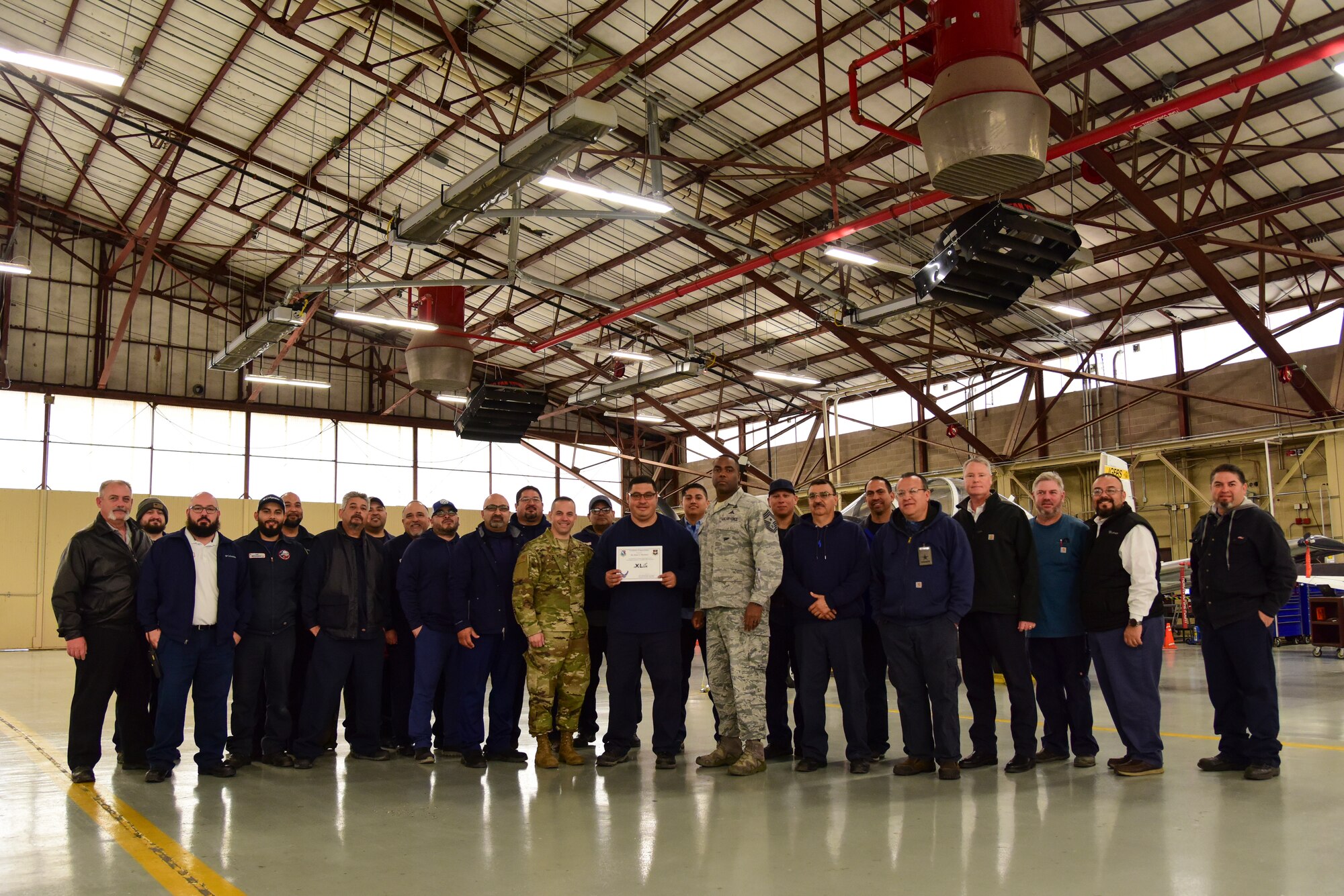 Rene Martinez, a 47th Maintenance Squadron aircraft mechanic, was chosen by wing leadership to be the “XLer” of the Week, Feb. 3, 2020, at Laughlin Air Force Base, Texas. The “XLer” award, presented by Col. Lee Gentile, 47th Flying Training Wing commander, and Chief Master Sgt. Robert L. Zackery III, 47th FTW command chief master sergeant, is given to those who consistently make outstanding contributions to their unit and the Laughlin mission. (U.S. Air Force photo by Senior Airman Anne McCready)