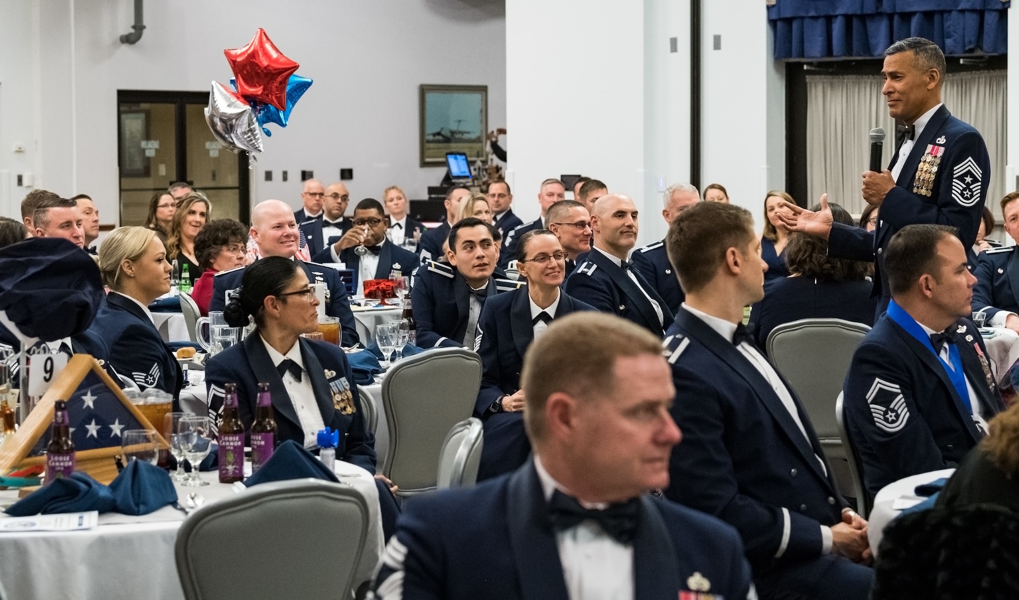 Chief Master Sgt. Terrence Greene, Air Mobility Command command chief, Scott AFB, Ill., speaks to attendees during the Chief Master Sergeant Recognition Ceremony at the Landings, Feb. 8, 2020, on Dover Air Force Base, Del. Greene was the guest speaker for the event, during which the newest chief master sergeants and chief master sergeant selects were honored for their promotion to the rank of chief master sergeant. (U.S. Air Force photo by Roland Balik)