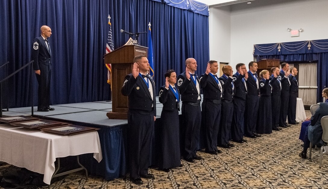 Eleven senior master and chief master sergeants take the Chief’s Charge during the Chief Master Sergeant Recognition Ceremony at the Landings, Feb. 8, 2020, on Dover Air Force Base, Del. Chief master sergeants make up only one percent of the total enlisted Air Force. (U.S. Air Force photo by Roland Balik)