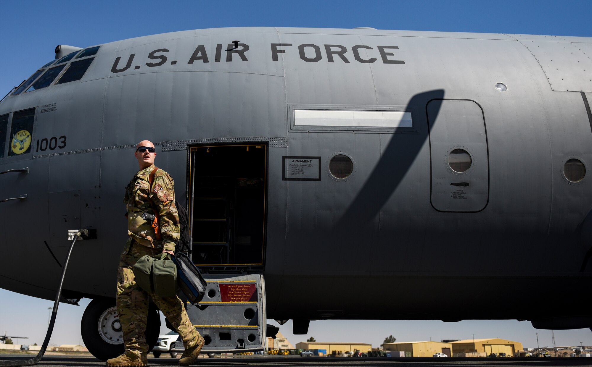 An Airplane sits on the flightline.