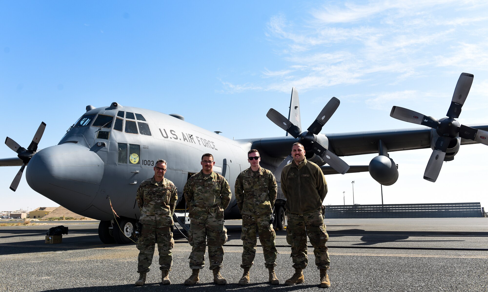 An Airplane sits on the flightline.