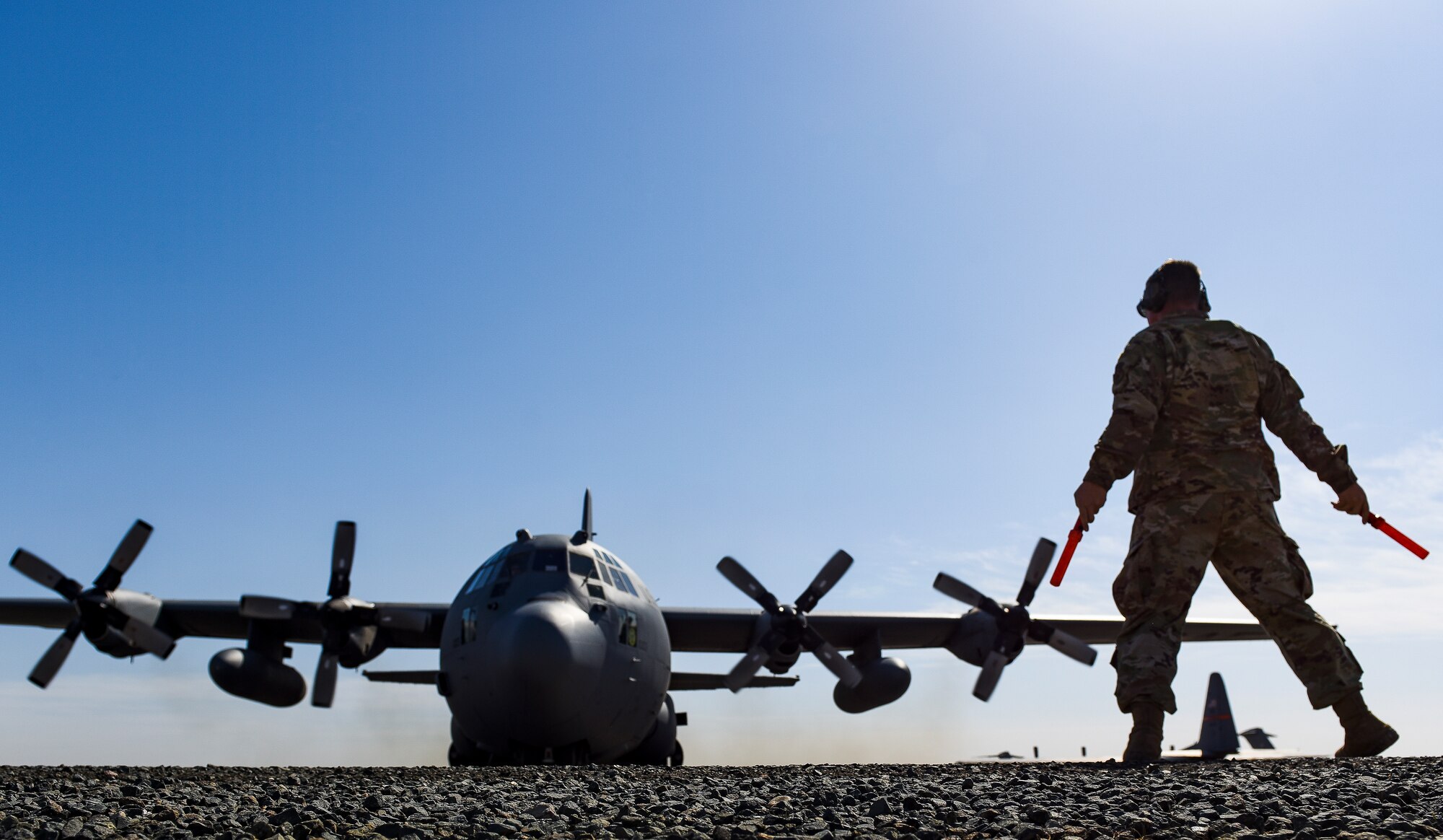 An Airplane sits on the flightline.