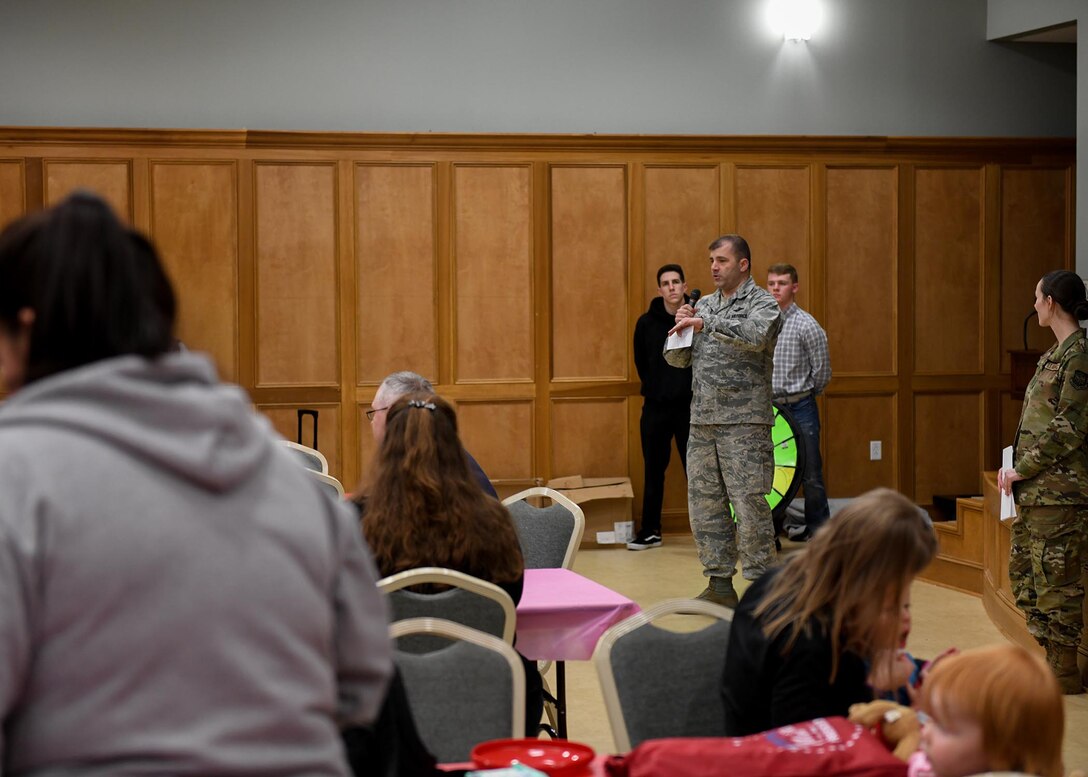Airmen come together for a deployed family dinner social event