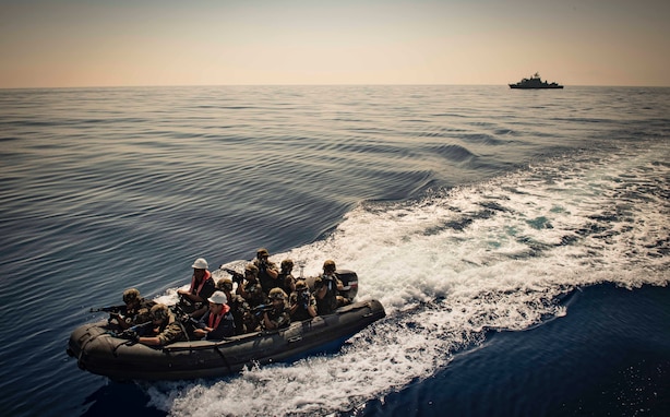 Algerian National Navy Sailors prepare to board the Tunisian Navy MNT Khaireddine A700 while participating in visit, board, search and seizure training during exercise Phoenix Express 2018, May 9.