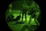 Airmen from the 148th Air Support Operations Squadron, Pennsylvania Air National Guard, perform a casualty evacuation drill during training Jan. 11, 2020, in Annville, Pennsylvania. The 148th ASOS performed a round-robin style training event, conducting tactical drills at night.