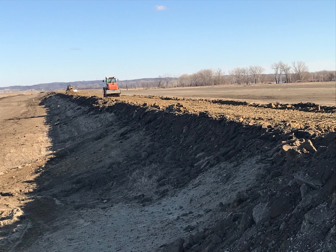 Levee L611-L614 has been restored to its pre-flood height.