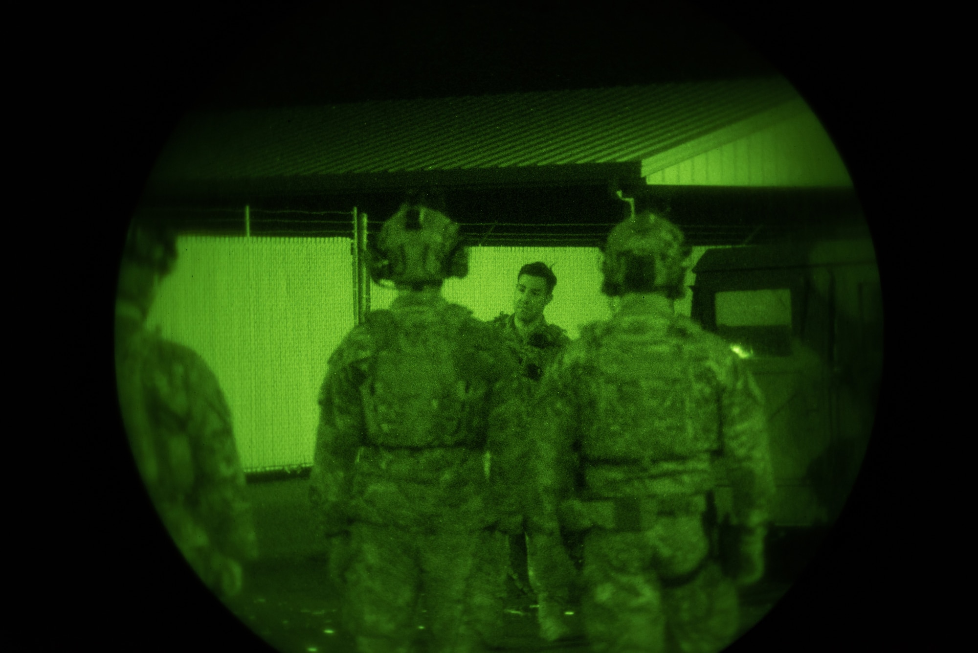 Tactical Air Control Party specialists from the 148th Air Operations Squadron perform night-time training.