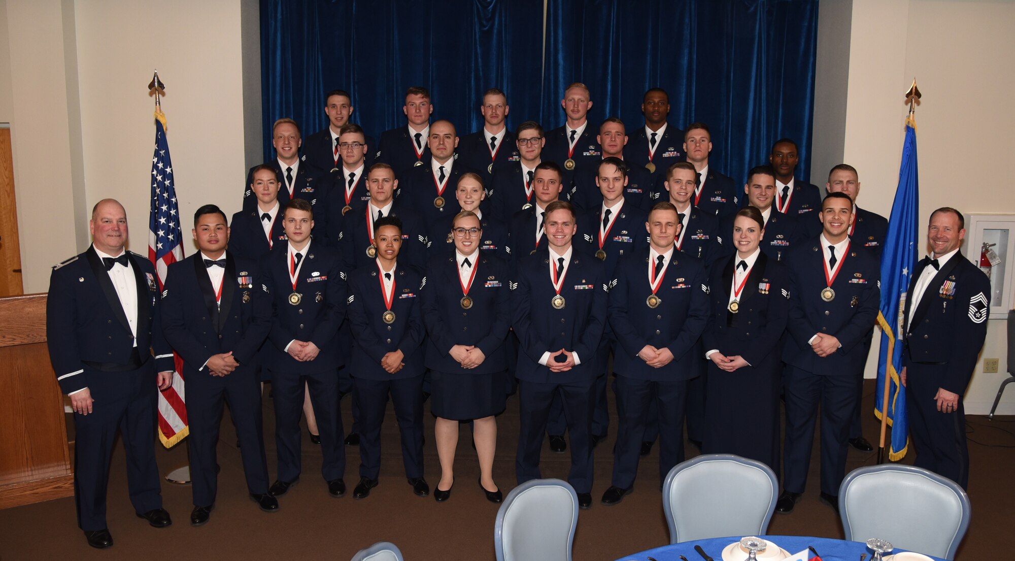 Airman Leadership School graduates posing for photo