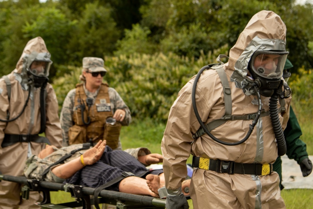 Soldiers evacuate a patient during a training exercise.