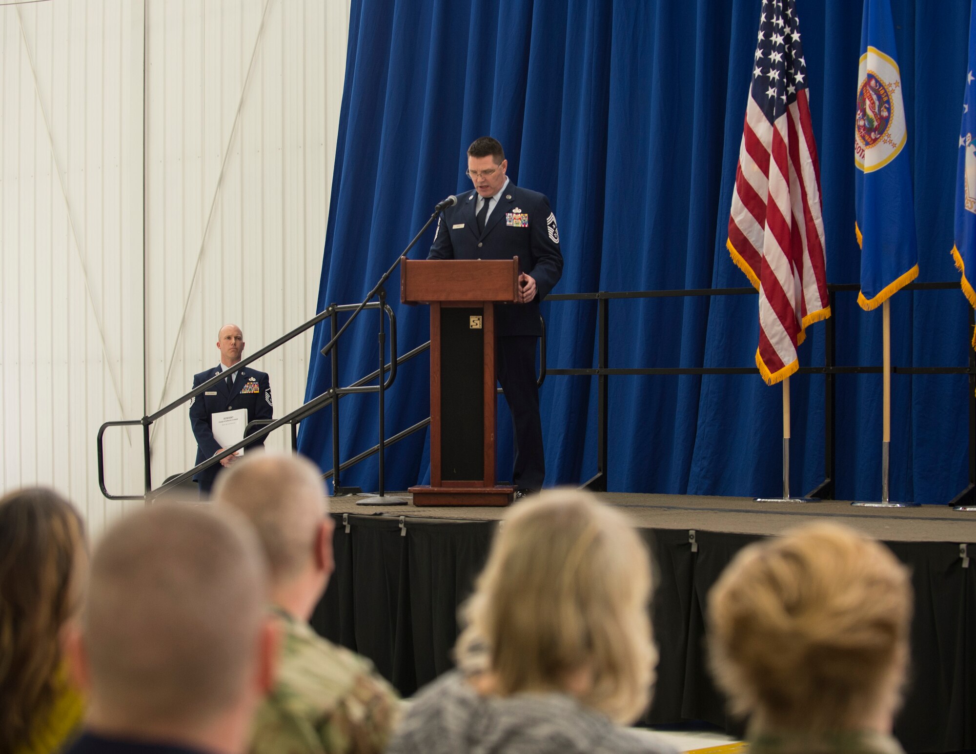 U.S. Air Force Command Chief Master Sgt. Lance Burg, 133rd Airlift Wing, speaks to Airmen, family, and friends before relinquishing his duties in St. Paul, Minn., Feb. 9, 2020.