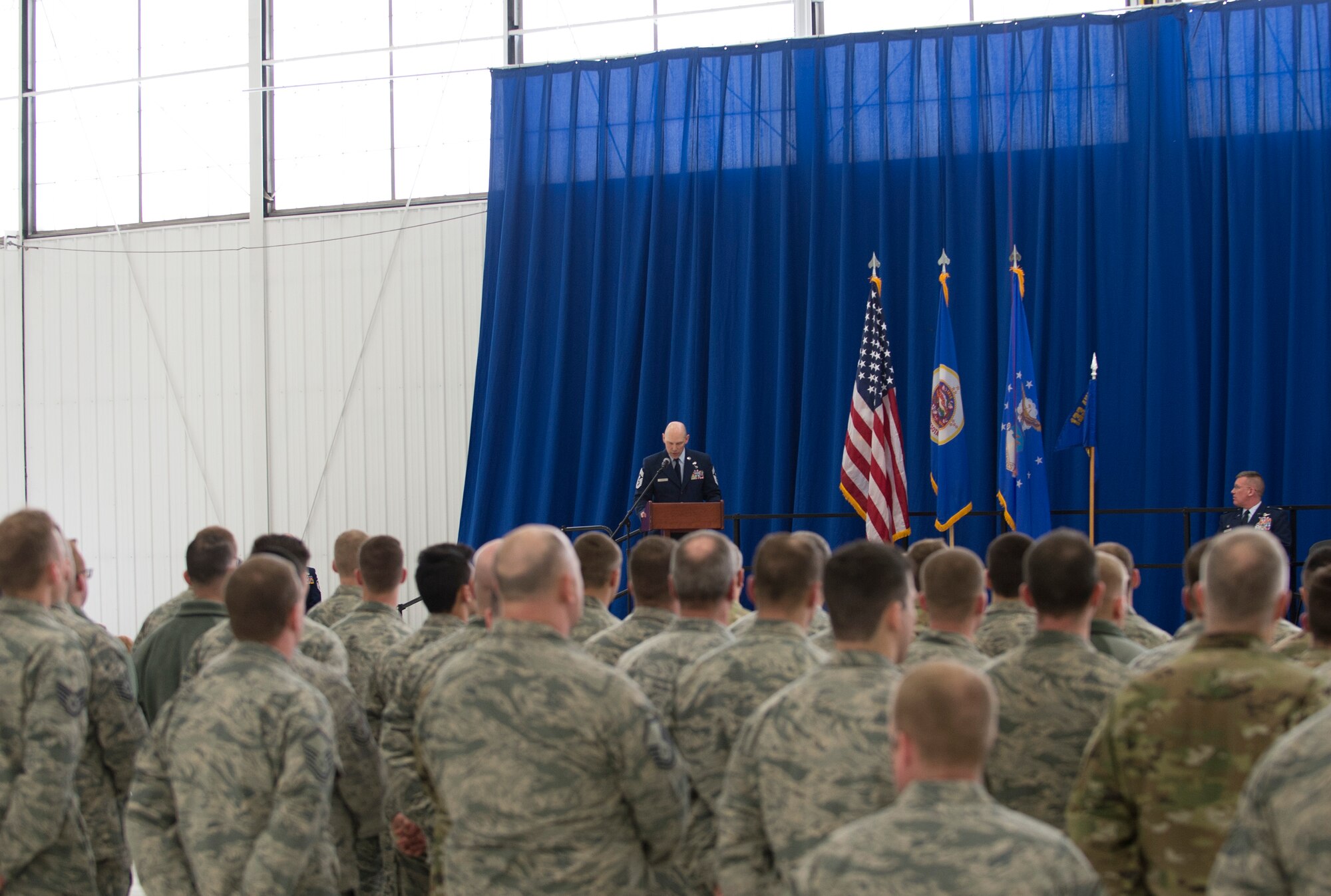 U.S. Air Force Command Chief Master Sgt. Mark Legvold, 133rd Airlift Wing, speaks to Airmen, family, and friends after receiving his duties as the 133rd Airlift Wing’s Command Chief from Col. James Cleet in St. Paul, Minn., Feb. 9, 2020.
