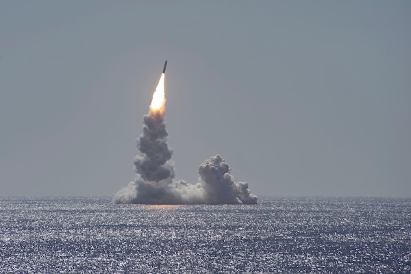 A missile is launched from a submarine.