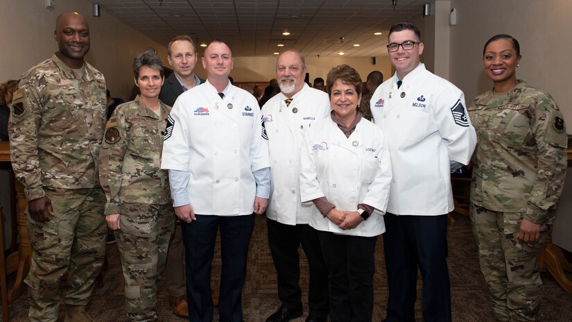 Sheppard Air Force Base leadership and force support squadron leadership pose with Hennessy Award evaluators at Sheppard AFB, Texas, Feb. 7, 2020. Sheppard has won three previous Hennessy Awards for their above and beyond dining facility operations. The Hennessy team is here to evaluate, giving Sheppard a chance for four wins. (U.S. Air Force photo by Senior Airman Pedro Tenorio)