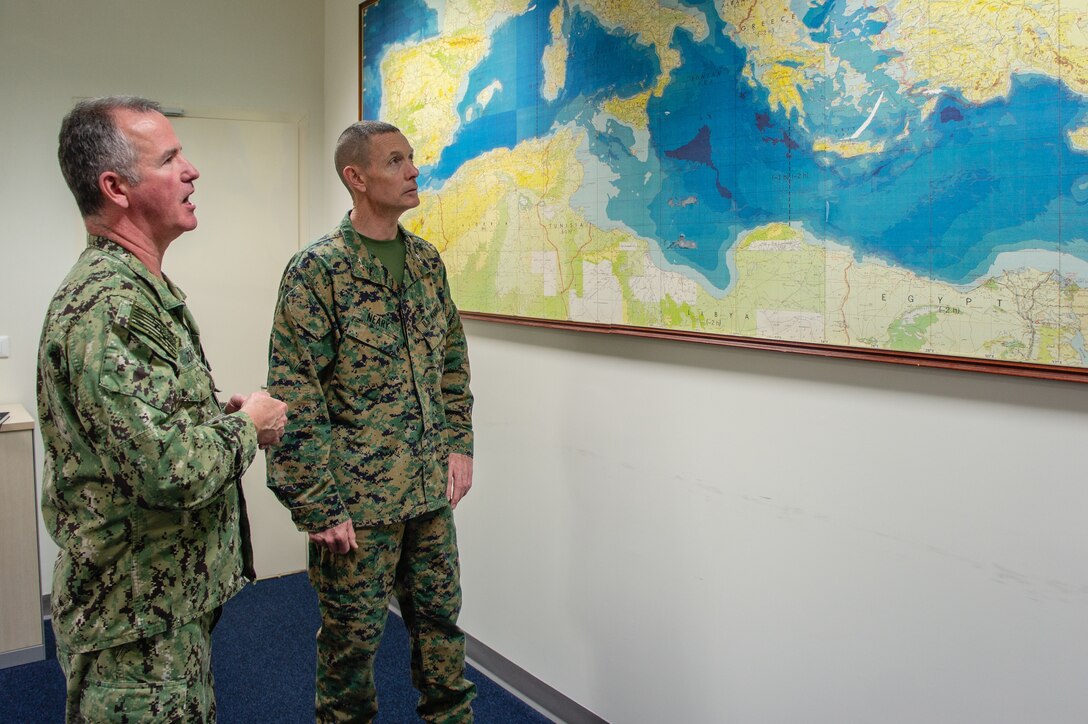 Maj. Gen. Stephen Neary, II Marine Expeditionary Force deputy commanding general, and Rear Adm. Matthew A. Zirkle, U.S. Naval Forces Europe-Africa chief of staff, discuss Navy and Marine Corps expeditionary capabilities during Maritime Preposition Force Exercise 20 at U.S. Naval Support Activity Naples, Italy, Feb. 12, 2020. MPFEX 20 demonstrates the ability of a Navy Marine Corps team to deploy, employ and redeploy a staff capable of commanding and controlling forces in support of operations in Europe. (U.S. Marine Corps photo by Staff Sgt. Hector de Jesus)