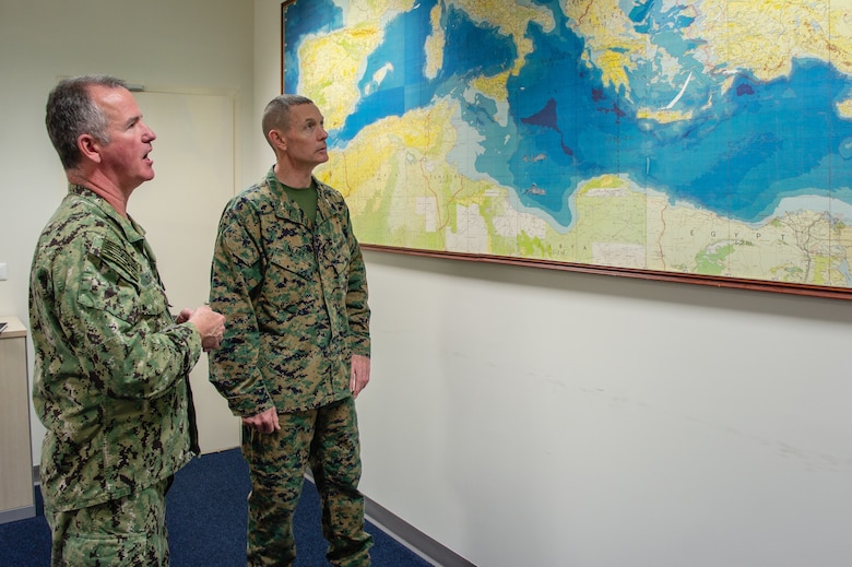 Maj. Gen. Stephen Neary, II Marine Expeditionary Force deputy commanding general, and Rear Adm. Matthew A. Zirkle, U.S. Naval Forces Europe-Africa chief of staff, discuss Navy and Marine Corps expeditionary capabilities during Maritime Preposition Force Exercise 20 at U.S. Naval Support Activity Naples, Italy, Feb. 12, 2020. MPFEX 20 demonstrates the ability of a Navy Marine Corps team to deploy, employ and redeploy a staff capable of commanding and controlling forces in support of operations in Europe. (U.S. Marine Corps photo by Staff Sgt. Hector de Jesus)