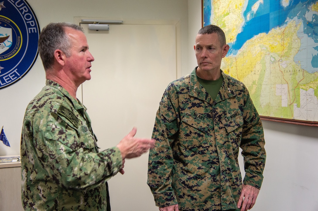 Maj. Gen. Stephen Neary, II Marine Expeditionary Force deputy commanding general, and Rear Adm. Matthew A. Zirkle, U.S. Naval Forces Europe-Africa chief of staff, discuss Navy and Marine Corps expeditionary capabilities during Maritime Preposition Force Exercise 20 at U.S. Naval Support Activity Naples, Italy, Feb. 12, 2020. MPFEX 20 demonstrates the ability of a Navy Marine Corps team to deploy, employ and redeploy a staff capable of commanding and controlling forces in support of operations in Europe. (U.S. Marine Corps photo by Staff Sgt. Hector de Jesus)