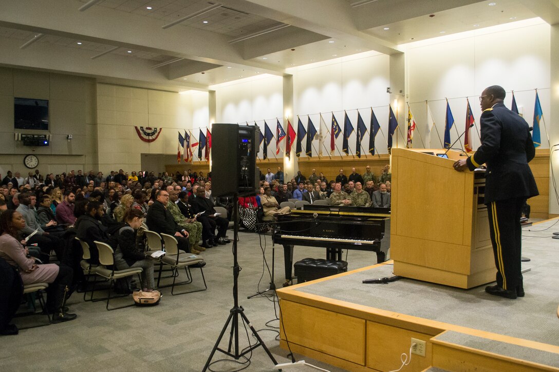 Army Brig. Gen. Gavin Lawrence, Defense Logistics Agency Troop Support Commander, speaks to a packed auditorium during the African American History Month event Feb. 12 in Philadelphia. The event celebrated African Americans through a multimedia presentation that included video, slideshows, narration and live music.