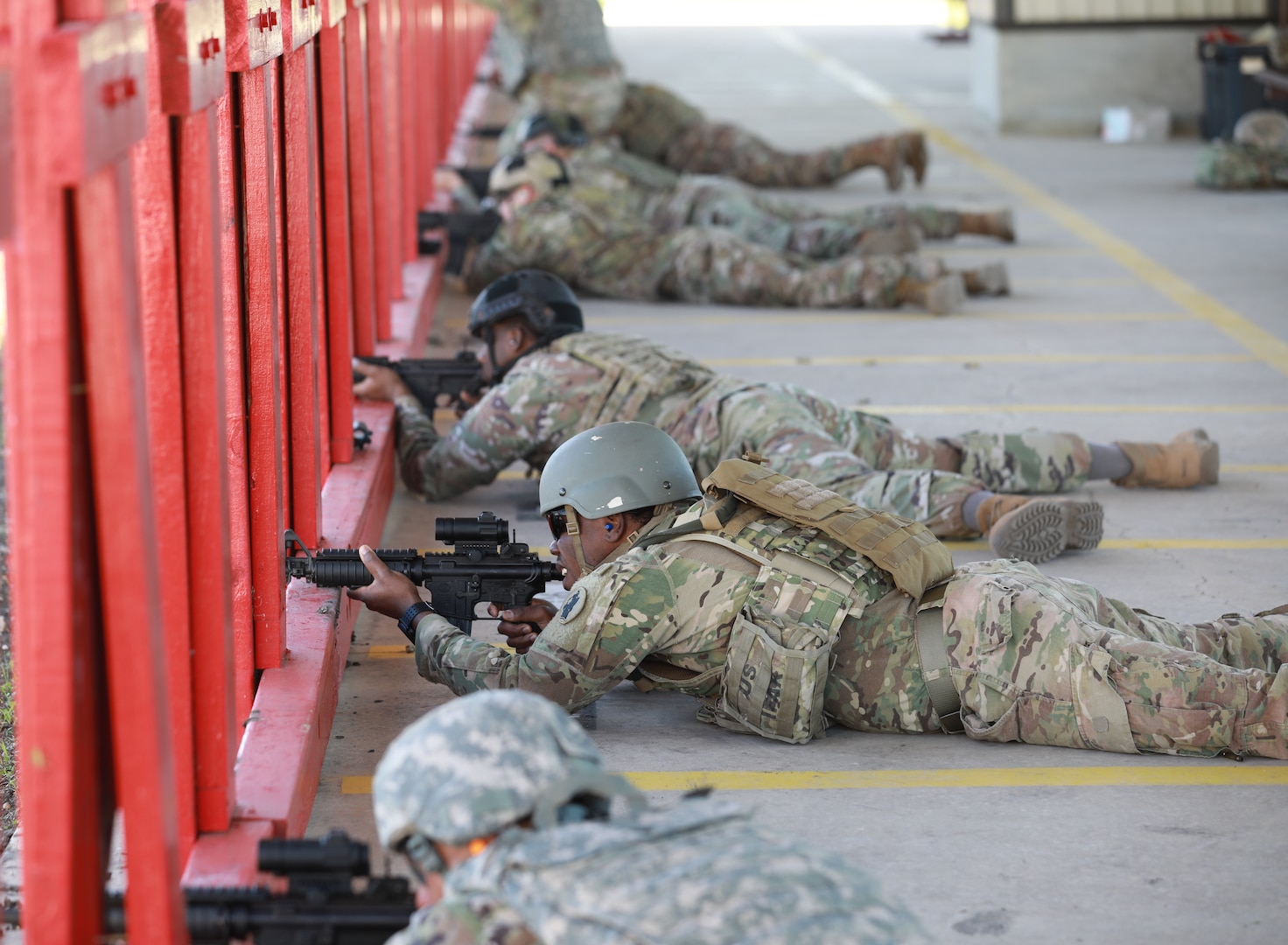 soldiers shooting rifles