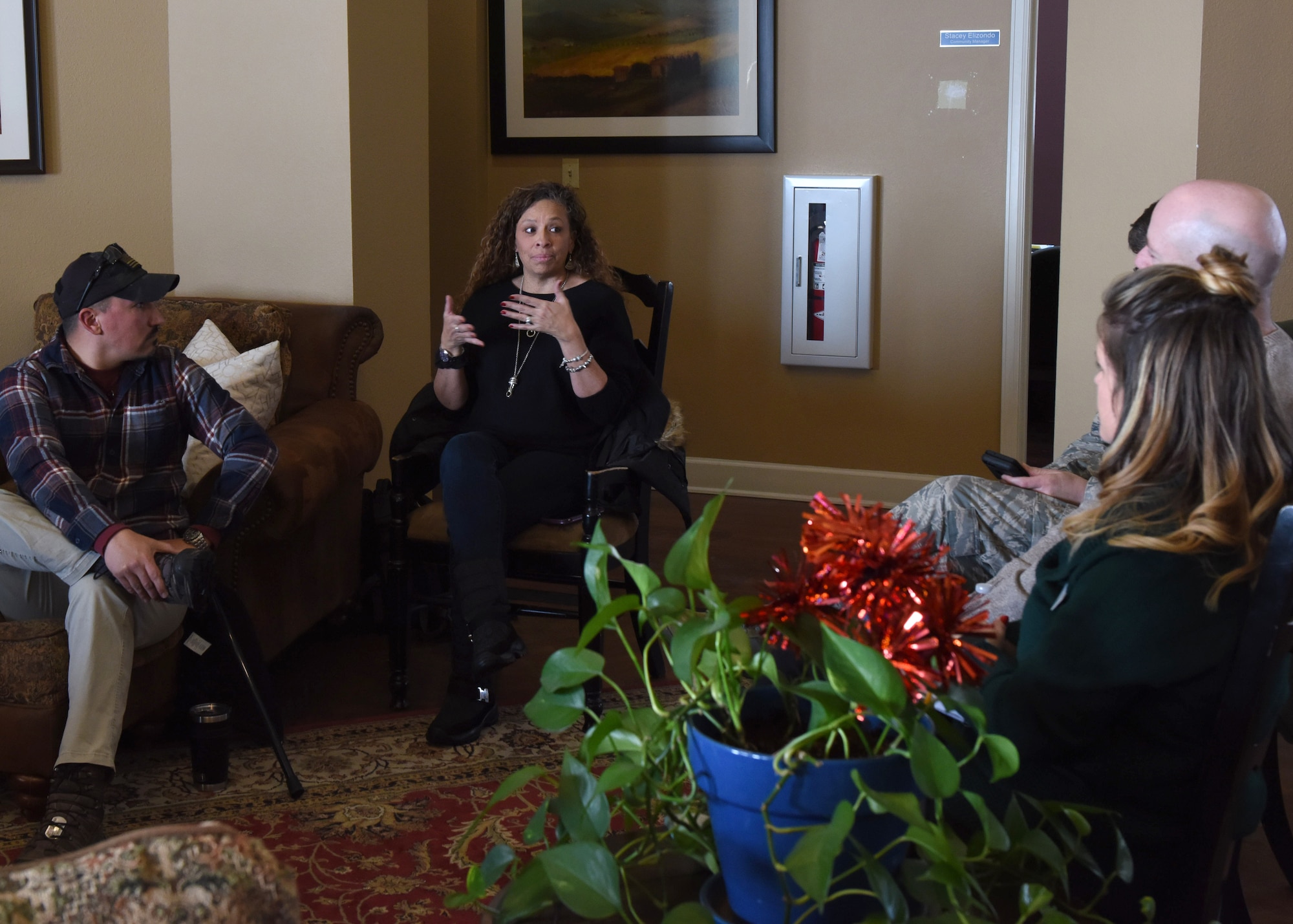 Members of the Community Advisory Board for Buckley Family Housing discuss concerns in the housing clubhouse at Buckley Air Force Base, Colo., Feb. 13, 2020. Advisory Board representatives are residents acting as liaisons between the housing community residents and the Buckley Family Housing leadership. (U.S. Air Force photo by Airman 1st Class Haley N. Blevins)