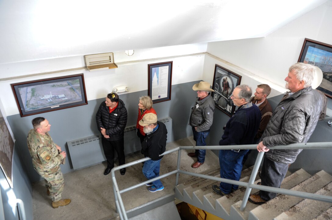 Master Sgt. Benjamin Smith briefs state legislators on missile maintenance during a visit to F. E. Warren Air Force Base, Wyoming, Feb. 7, 2020. The legislators visited the base to learn about the 90th Missile Wing mission and meet Airmen. The representatives and senators saw demonstrations of the missile procedures trainer, missile maintenance trainer, explosive ordnance disposal and security forces. (U.S. Air Force photos by Joseph Coslett)