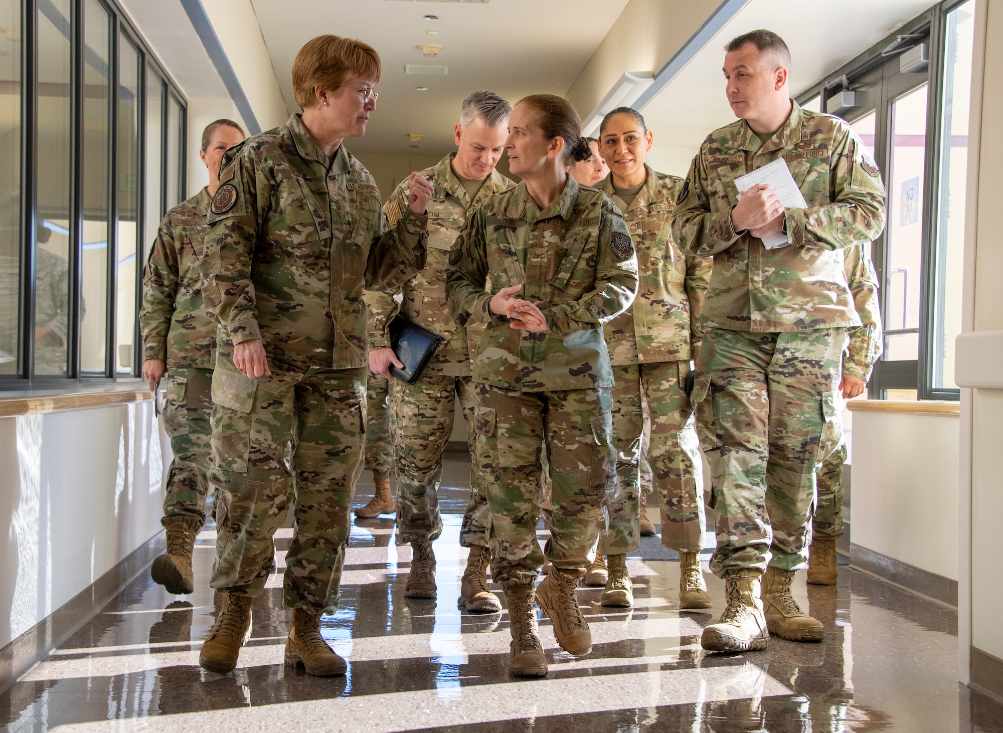 U.S. Air Force Lt. Gen. Dorothy Hogg, Air Force Surgeon General, left, and Col. Beth Dion, 60th Inpatient Squadron commander, center, discuss operational readiness of the medical force during a visit to the central medical surgical unit, David Grant USAF Medical Center at Travis Air Force Base, California, Feb. 10, 2020. Hogg visited with 60th Medical Group Airmen and recognized the positive impact they have on their community through their innovative medical practices. (U.S. Air Force photo by Heide Couch)