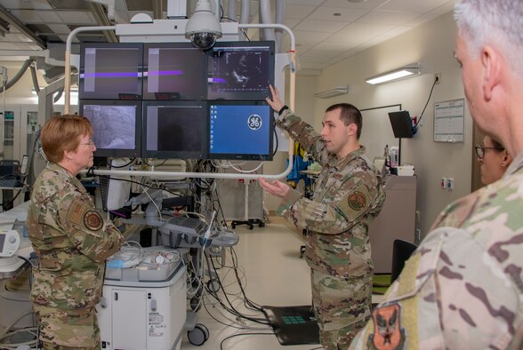 U.S. Air Force Master Sgt. Trey Garner, center, 60th Medical Group cardiology services manager provides an overview of a cardio suite while Lt. Gen. Dorothy Hogg, left, Air Force Surgeon General, looks on during a tour through the Heart,  Lung and Vascular Center, David Grant USAF Medical Center at Travis Air Force Base, California, Feb. 10, 2020. Hogg visited with 60th Medical Group Airmen and recognized the positive impact they have on their community through their innovative medical practices. (U.S. Air Force photo by Heide Couch