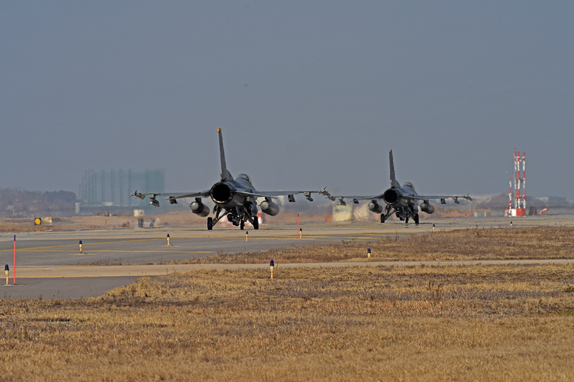 U.S. Air Force F-16 Fighting Falcons assigned to the 8th Fighter Wing prepare to take-off for a routine training flight at Kunsan Air Base, Republic of Korea, Feb. 12, 2020. The 8th FW is home to two fighter squadrons, the 35th Fighter Squadron “Pantons” and 80th FS “Juvats.” They perform air and space control roles including counter air, strategic attack, interdiction and close-air support missions. (U.S. Air Force photo by Staff Sgt. Mackenzie Mendez)