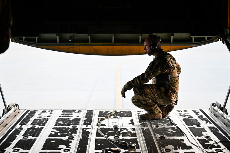 A U.S. Air Force HC-130J Combat King II loadmaster with the 79th Expeditionary Rescue Squadron, deployed to Al Udeid Air Base, Qatar, runs through preflight checklists before a personnel recovery training mission at Al Udeid AB, Feb. 6, 2020.