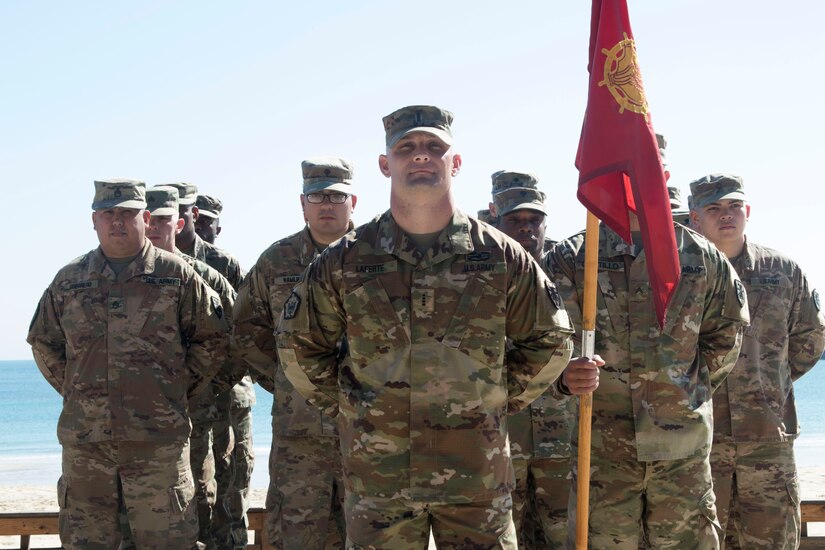 Chief Warrant Officer 4 Nicholas Laferte, commander, 492nd Theater Harbormaster Operations Detachment (THOD), stands at the front of his formation during the 492nd THOD's end of mission ceremony at Kuwait Naval Base, Feb. 13, 2020.