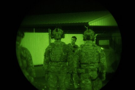 Tactical Air Control Party specialists from the 148th Air Operations Squadron perform night-time training.