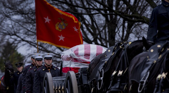 U.S. service members, family and friends march to Arlington National Cemetery, in Arlington, Va., for the funeral service for retired Commandant of the Marine Corps (CMC) Gen. Paul X. Kelley. Kelley served as CMC from 1983 to 1987. (U.S. Marine Corps photo by Lance Cpl. Morgan L. R. Burgess)