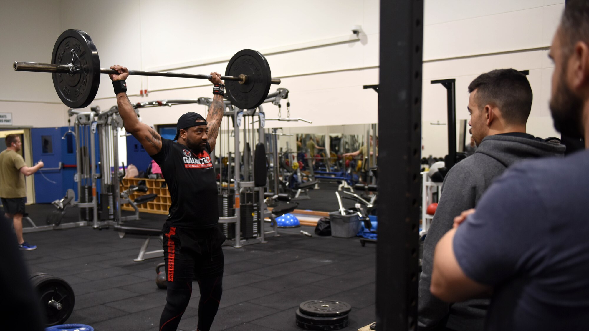 Staff Sgt. Corey Bryant, 39th Security Forces Squadron vault storage area supervisor, demonstrates a lift during his fitness class, at Incirlik Air Base, Turkey, Feb. 6, 2020.