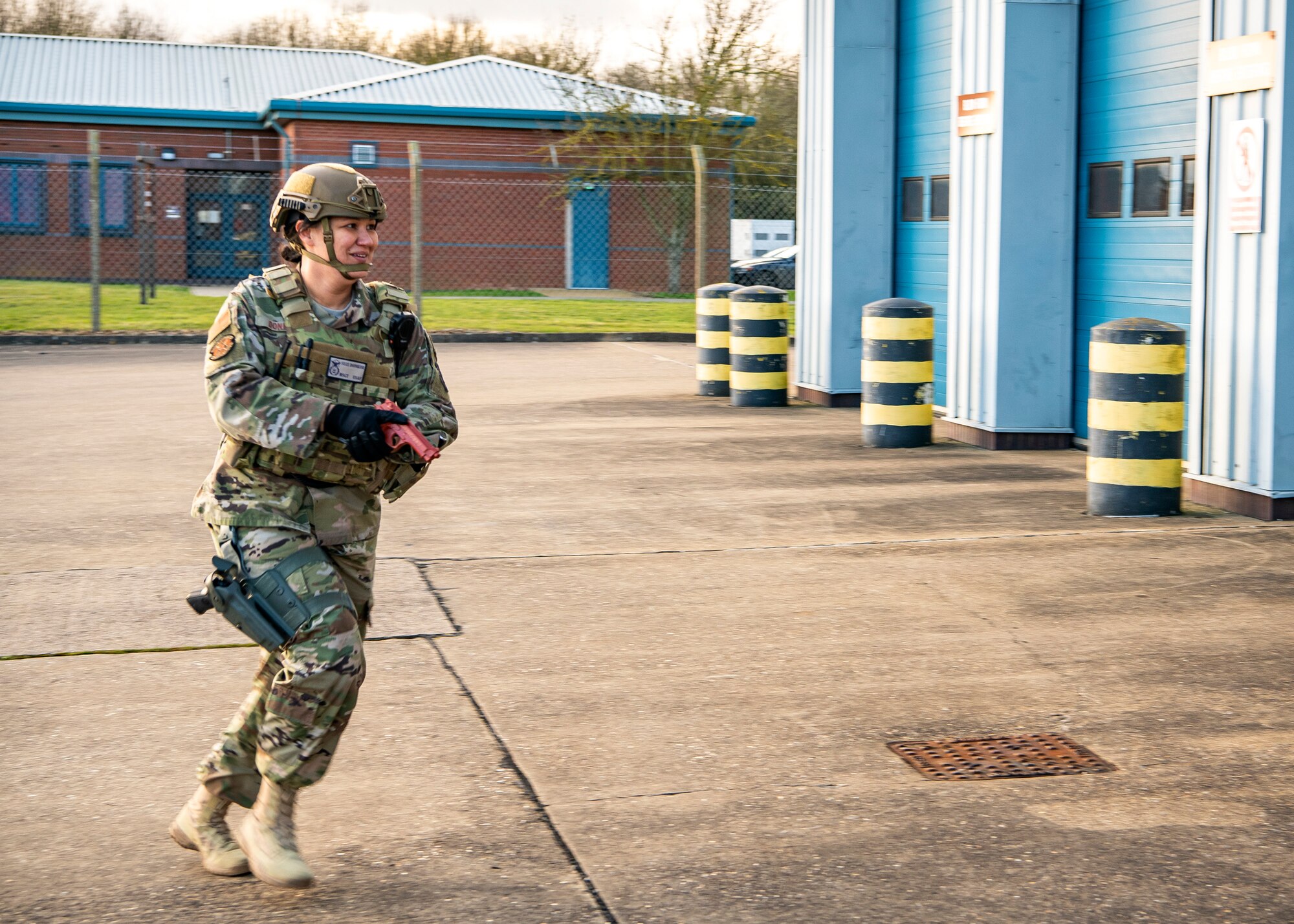 Master Sgt. Suzanna Donkor, 423d Security Forces Squadron flight chief, prepares to enter a building as a first responder during a readiness exercise, at RAF Molesworth, England, Feb. 11, 2020. The exercise tested the wing’s preparedness and response capabilities to an emergency situation. (U.S. Air Force photo by Senior Airman Eugene Oliver)