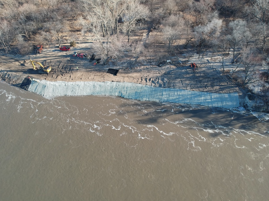 Aerial view shows contractors installing fleximat on the Western Sarpy levee repair project.