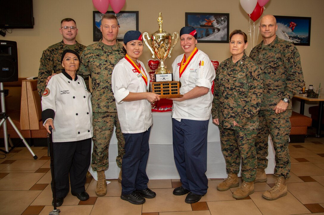 Courtney Naro and Sompone Douangdara, both Sodexo food service specialists with the French Creek dining facility on MCB Camp Lejeune were awarded 1st place during a culinary competition at the Wallace Creek dining facility on MCB Camp Lejeune, North Carolina, Feb. 11, 2020.