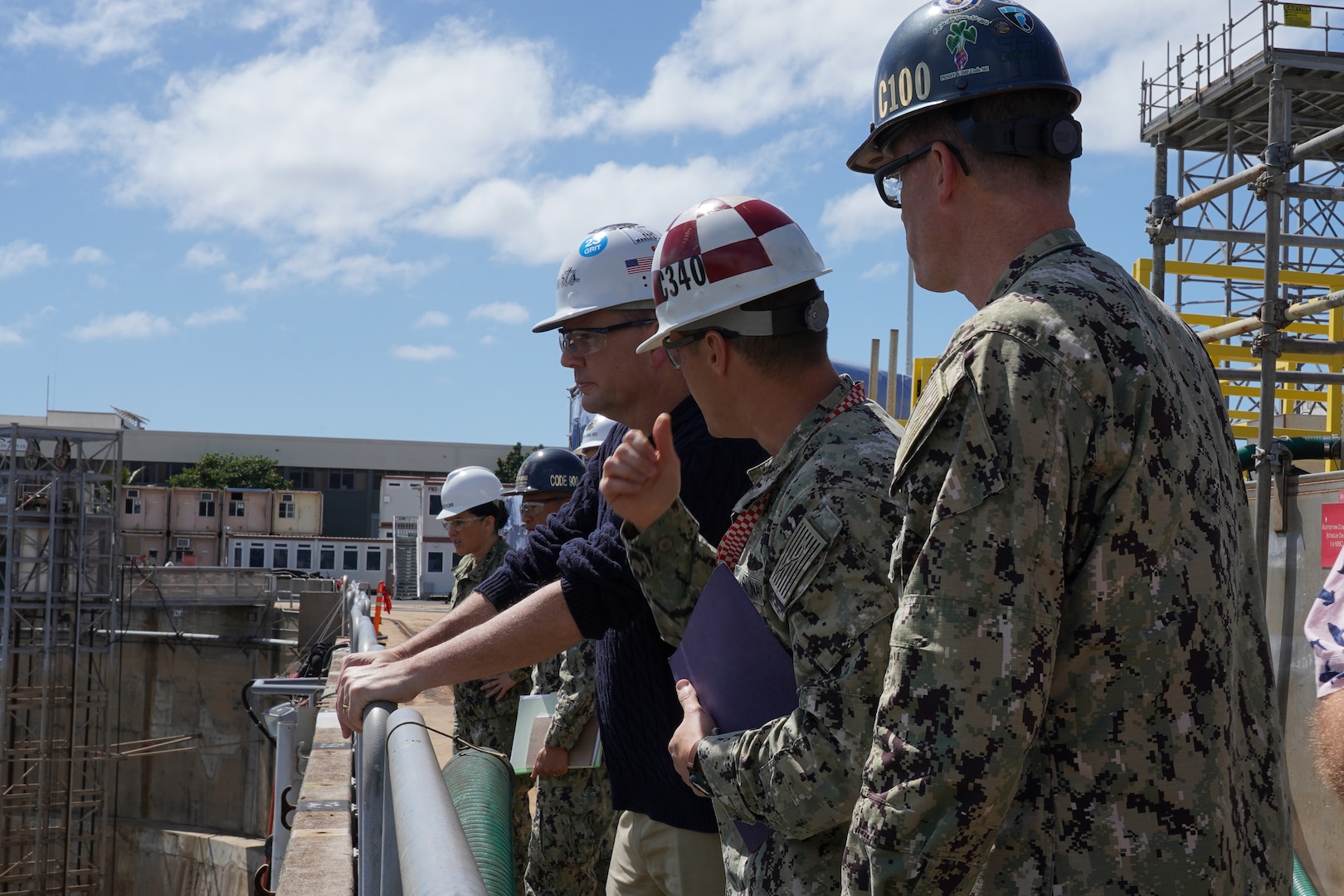 James F. Geurts, assistant secretary of the Navy for research, development and acquisition, looks into Pearl Harbor Naval Shipyard & Intermediate Maintenance Facility’s Dry Dock #3. In Fiscal Year 2023 once the last Los Angeles-class submarine availability is complete, the shipyard’s Dry Dock #3 will become obsolete due to its size. To maintain and grow PHNSY & IMF’s nuclear maintenance capacity and provide best value to taxpayers, the Shipyard Infrastructure Optimization Program will optimize this critical shipyard location.