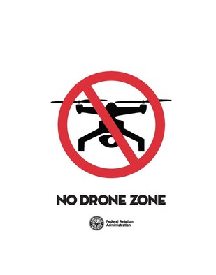 A graphic displaying a no drone warning sign.