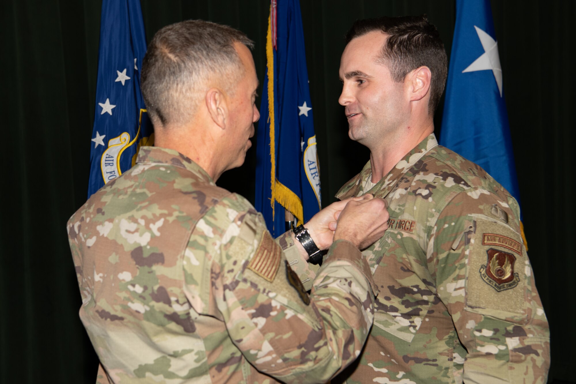 Maj. Gen. Tom Wilcox, Air Force Installation and Mission Support Center commander, awards the Bronze Star to Capt. Shane Lockridge at a commander’s call Feb. 13.