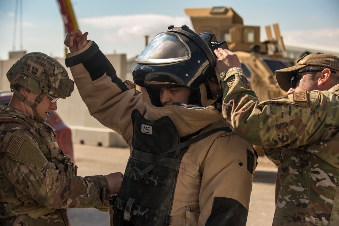 Explosive ordnance disposal team respond to a suspicious package