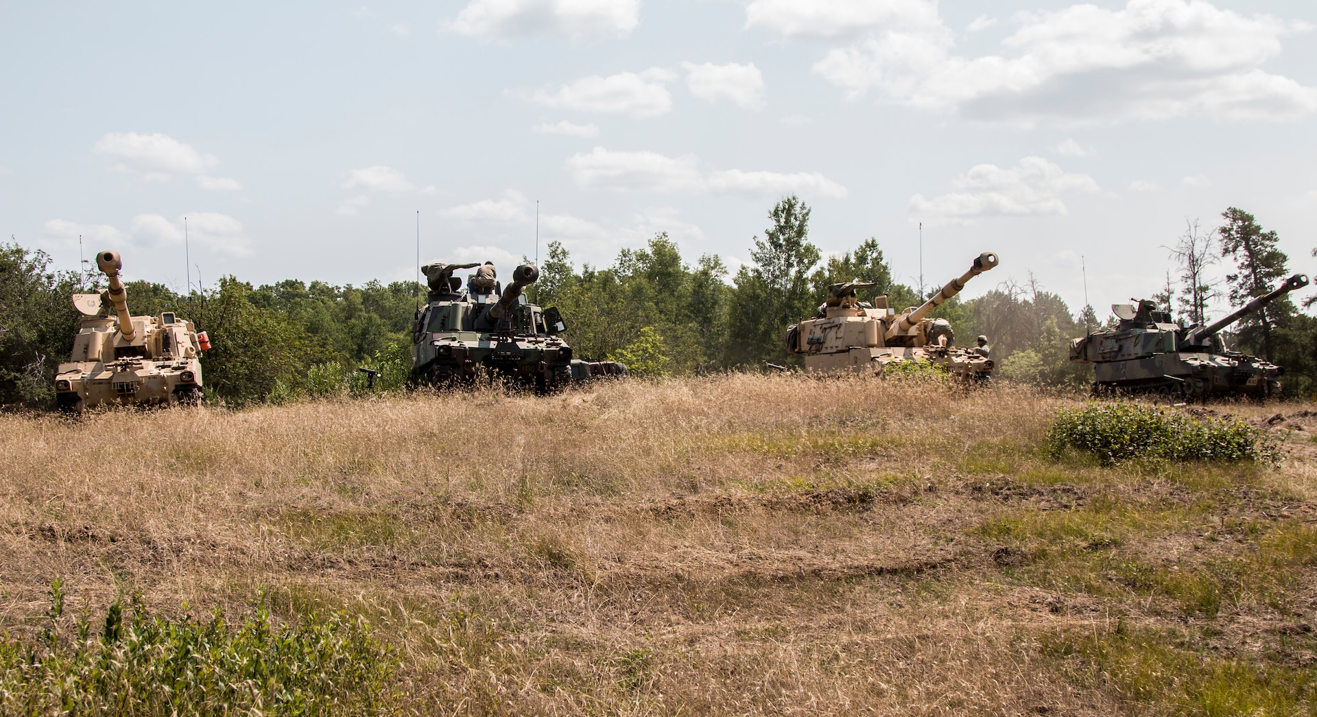 Soldiers assigned to Battery B, 1st Battalion, 201st Field Artillery, West Virginia Army National Guard, stage M109A7 Howitzers during exercise Northern Strike at Camp Grayling, Mich., on Aug. 8, 2018. The 201st FA is providing fire support operations during the joint multinational combined arms live fire exercise. (U.S. Army National Guard photo by Sgt. Tawny Schmit)